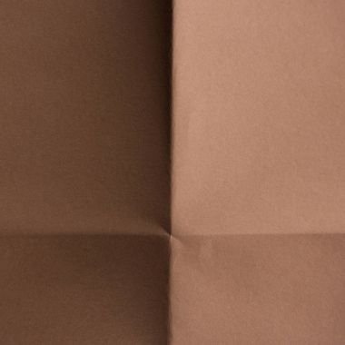 close-up shot of brown colored folded paper for background clipart