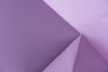 close-up shot of folded purple paper clipart