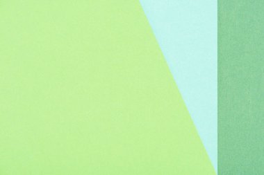 close-up shot of green and blue paper layers for background clipart