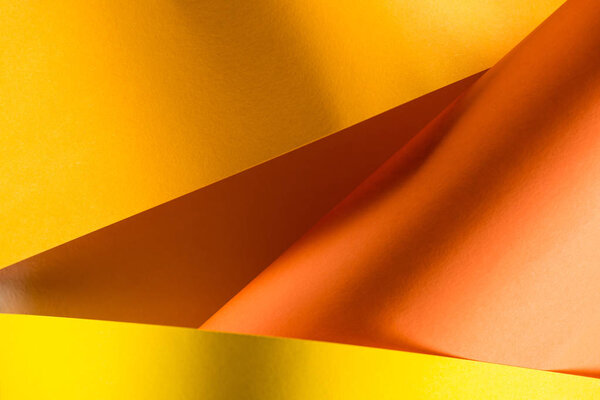 close-up shot of orange and yellow colored papers for background