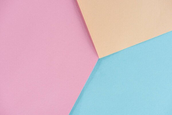 geometrical composition made of pastel colors papers