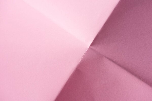 close-up shot of folded pink paper for background
