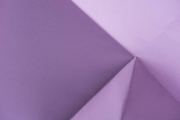 close-up shot of folded purple paper