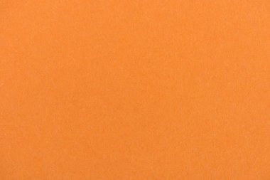 texture of orange color paper as background clipart