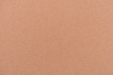 texture of light brown color paper as background