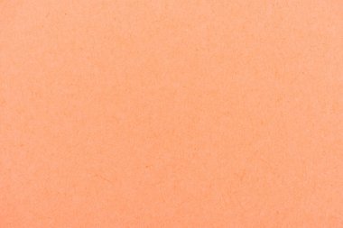 texture of peach-orange color paper as background clipart