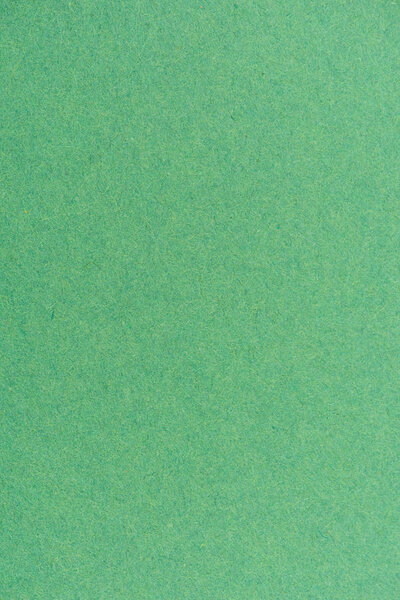 texture of green color paper as background