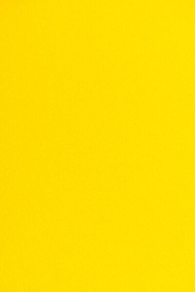 texture of yellow color paper as background