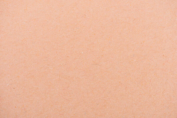 texture of peach-orange color paper as background