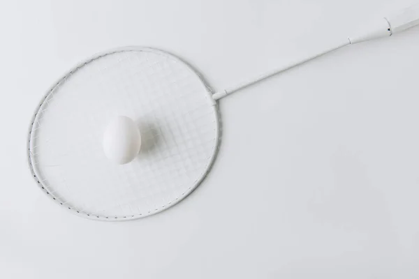 White Egg Laying Tennis Racket — Stock Photo, Image