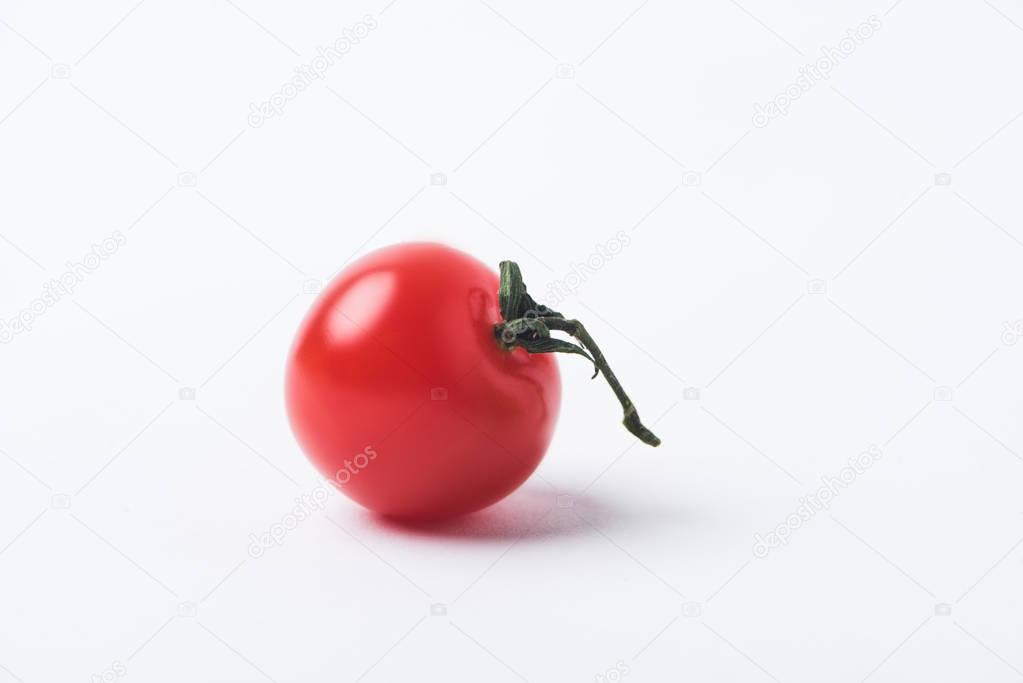 Red ripe tomato isolated on white background