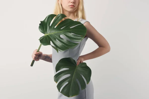 Cropped Shot Young Woman Covering Monstera Leaves Isolated White — Stock Photo, Image