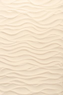 Wavy sandy beach texture for summer travel background clipart