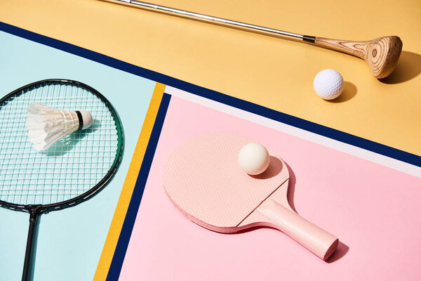 Equipment for badminton, golf and table tennis on colorful background with lines