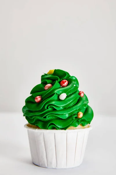 Tasty Christmas Tree Cupcake White Surface Isolated Grey — Stock Photo, Image