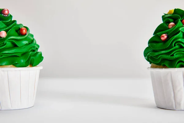 Tasty Christmas Tree Cupcakes White Surface Isolated Grey Copy Space — Stock Photo, Image