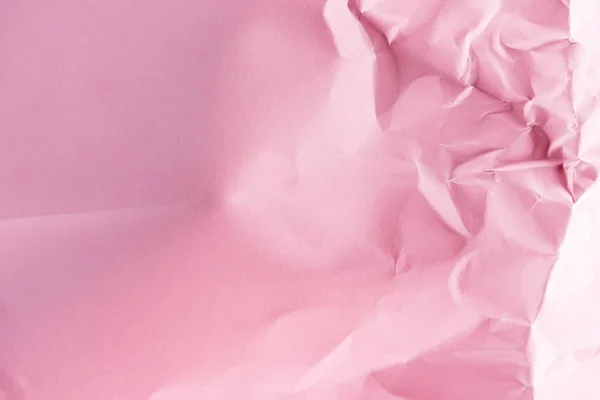 Close-up shot of crumpled pink paper for background — Stock Photo