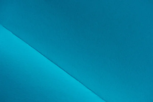 Close-up shot of folded blue paper for background — Stock Photo