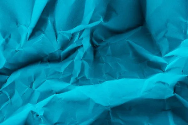 Plan rapproché de papier bleu froissé pour fond — Photo de stock