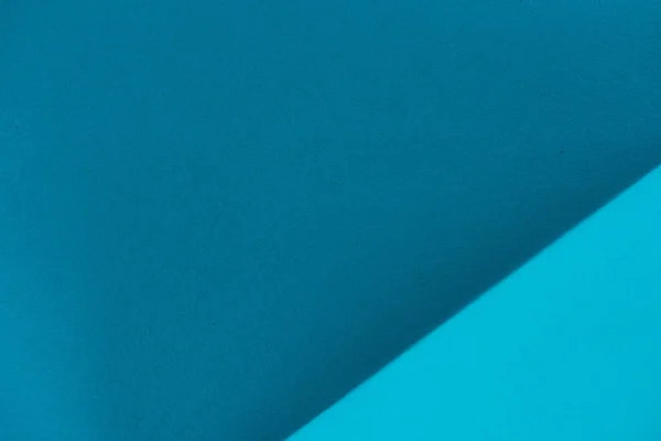 Close-up de papel azul dobrado — Fotografia de Stock
