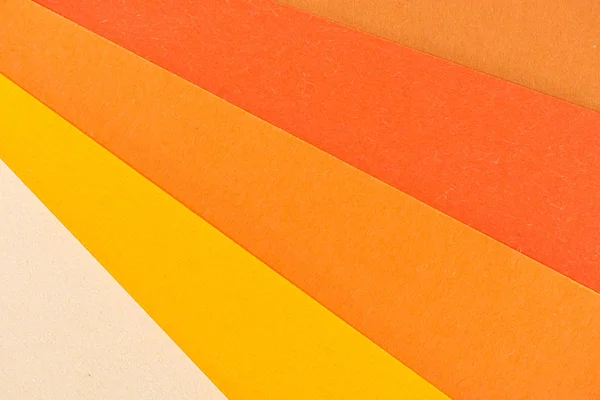 Primer plano de capas de papel de colores para el fondo - foto de stock