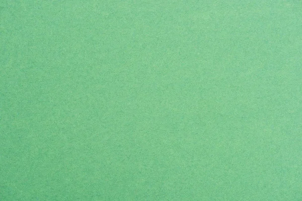 Close-up shot of green color paper texture for background — Stock Photo