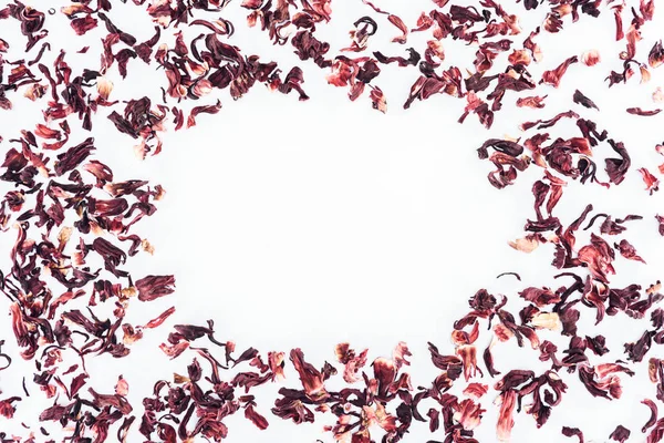 Top view of frame made with hibiscus tea isolated on white — Stock Photo