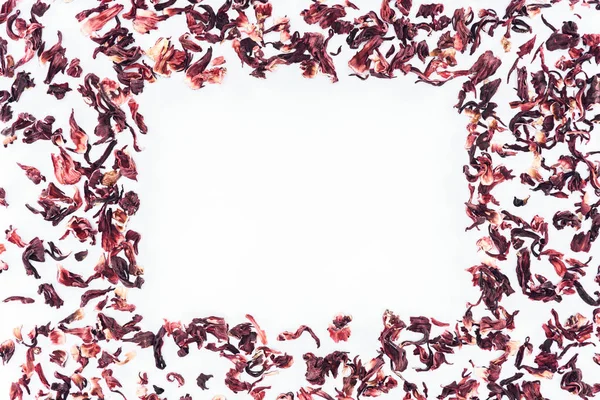 Top view of frame made with hibiscus tea isolated on white — Stock Photo