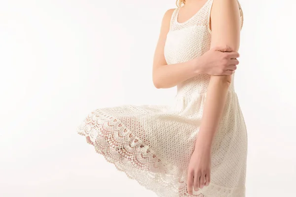 Vista cortada de menina elegante em vestido de renda branca, isolado em branco — Stock Photo
