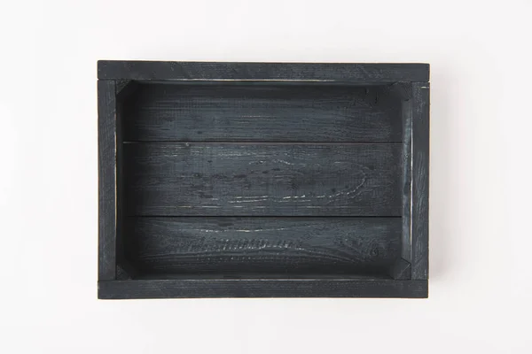 Caja de madera oscura vacía aislada sobre fondo blanco - foto de stock