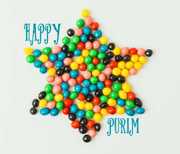 Top view of star made of sweets isolated on grey, purim holiday concept — Stock Photo
