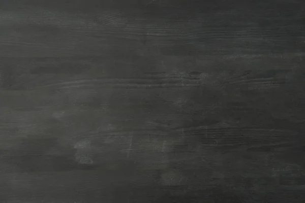 Top view of empty black wooden tabletop as background — Stock Photo