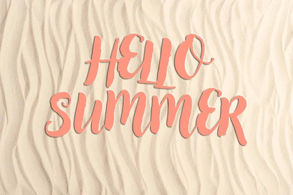 Hello summer inscription on sandy beach — Stock Photo