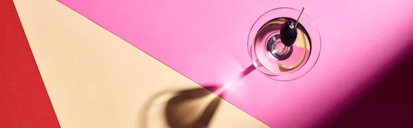 Top view of martini cocktail on colorful background, panoramic shot — Stock Photo