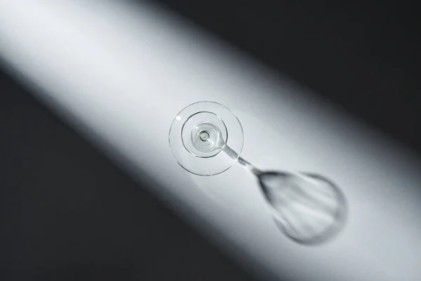 Top view of empty glass for martini on grey background — Stock Photo