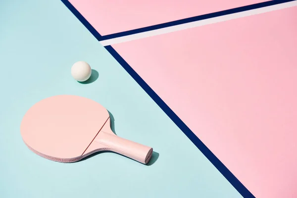 Tennis racket and ball on pastel background with blue lines — Stock Photo