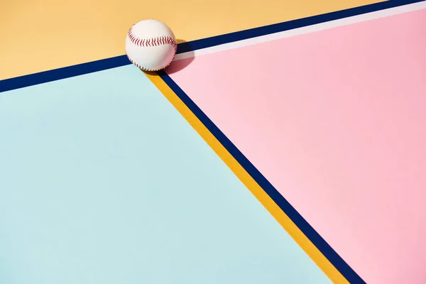 Baseball with shadow on colorful background with lines — Stock Photo