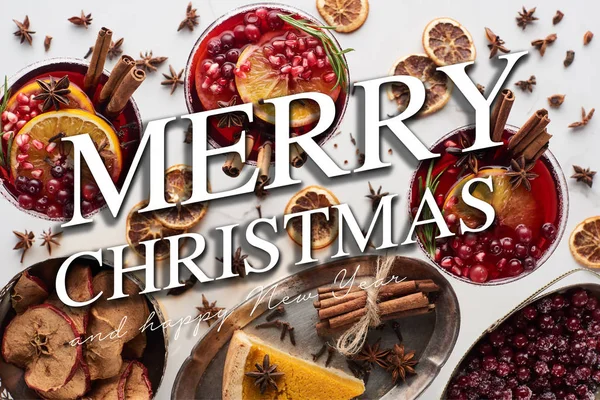Top view of christmas cocktails with orange, pomegranate, cinnamon, pie on tray, dry apples and frozen cranberry with merry Christmas and happy new year illustration — Stock Photo