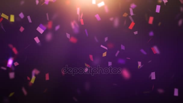 Confeti cayendo sobre fondo púrpura Fotografías de stock