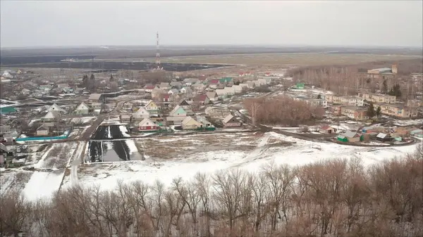 Russian village in the winter. small workers\' settlement. Russian small town in the winter. Worker settlement in Russia top view