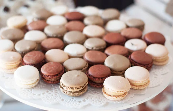 Sweet Brown and White color Macaroons. Candy Bar for a Party Table. View from Above. — Stock Photo, Image