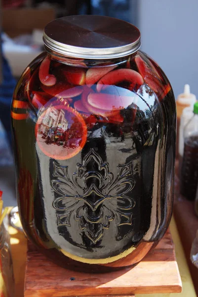 Traditional Jar Red Sangria Lemonade Drink Different Citrus Fruits over Grunge Wooden background. Summer Cold Drink Selective focus — Stock Photo, Image