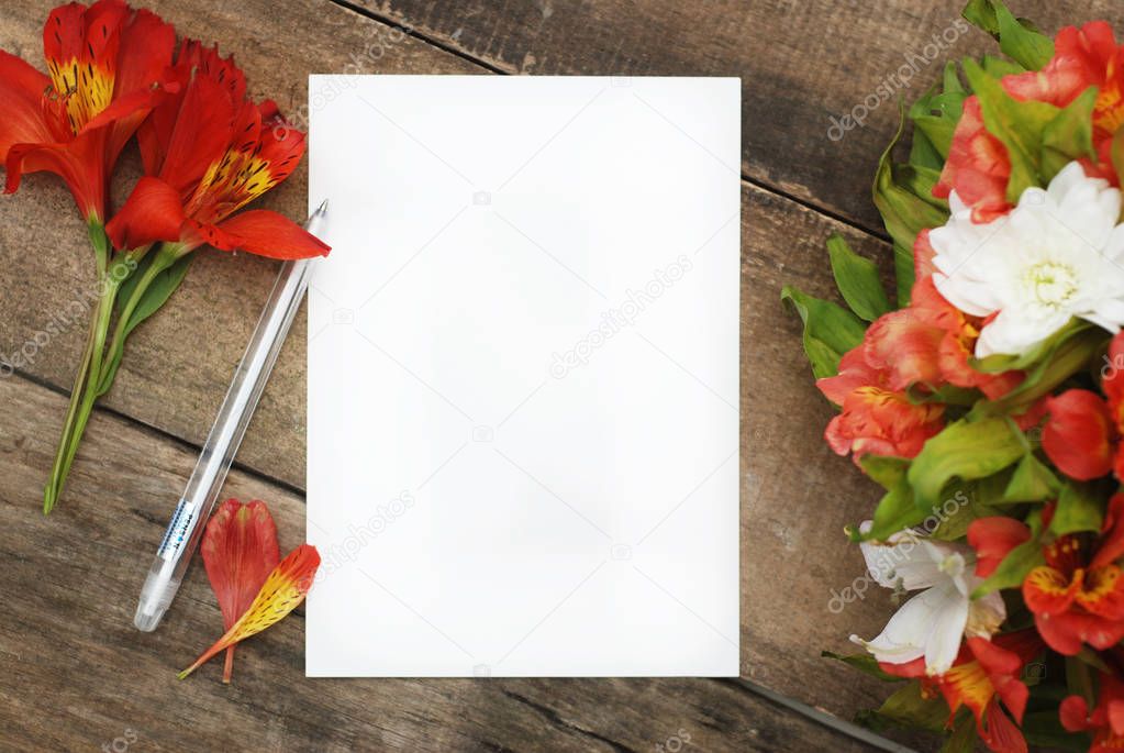 White Empty Blank Paper Beautiful Alstroemeria Flowers Rustic wooden Table