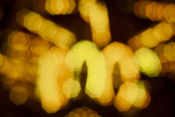 Natal feriado abstrato textura luzes amarelo bokeh fundo — Fotografia de Stock