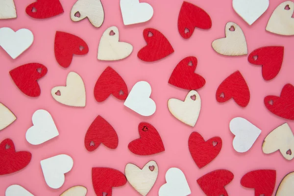 Valentine's day pink background with red hearts pattern, flat lay. Birthday, party love. — Stock Photo, Image