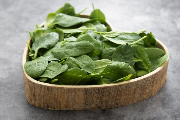 fresh spinach leaves or spinach salad background