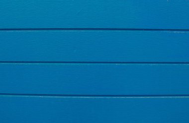 Mavi ahşap duvar arka plan dokusu kadar kapatın. (Seçici odak)