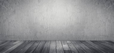 Beyaz beton duvardan ve ahşap zeminden oluşan boş uzay stüdyosunun soyut siyah beyaz görüntüsü.