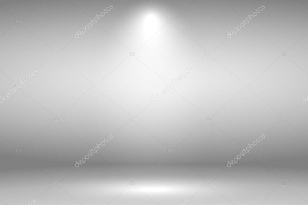 White stage with spot lighting in gray background.