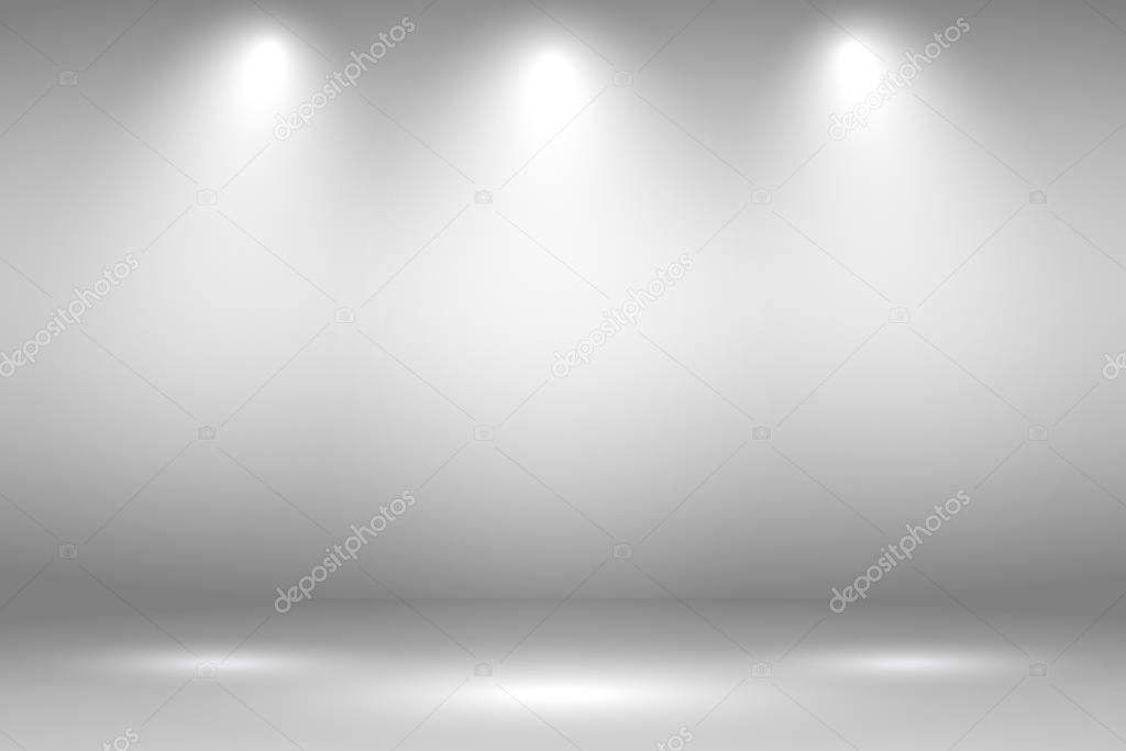 White stage with spot lighting in gray background.